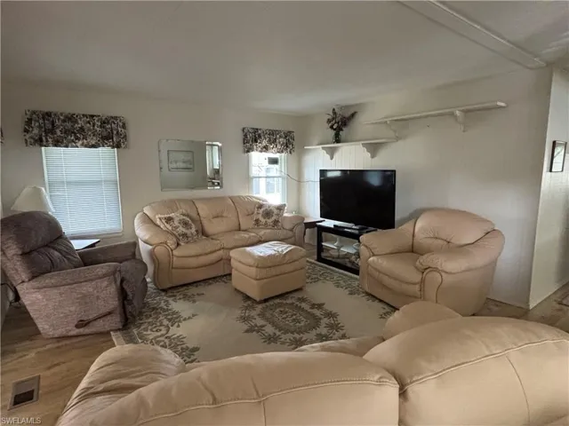Living room withwood finished floors