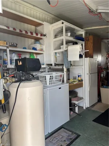 Clothes washing area with washer / clothes dryer