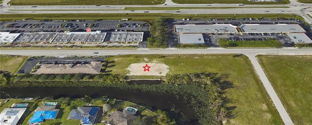 Aerial view of property and surrounding area