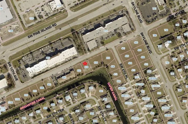 Aerial view of property and surroundings.