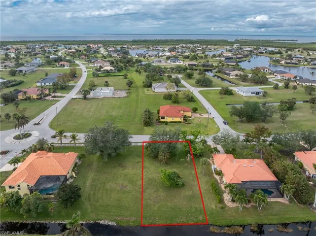 Bird's eye view with a water view and a residential view