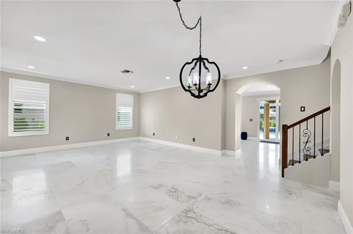 Front Entrance living area with beautiful reimagined stairway.