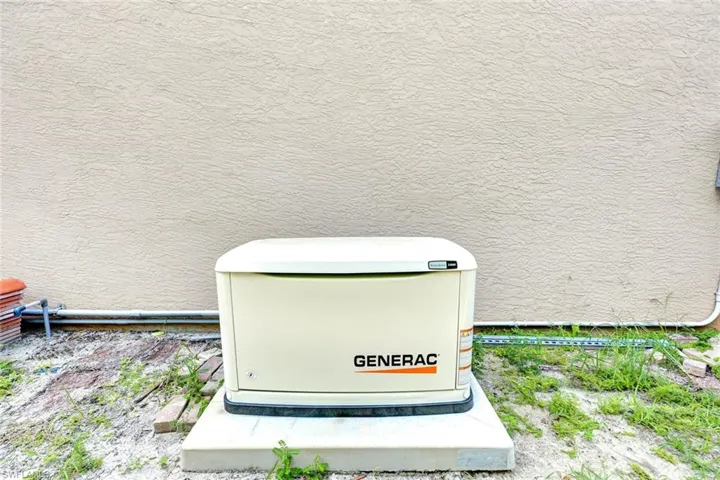 Generac whole-home generator with 500 gal propane tank.