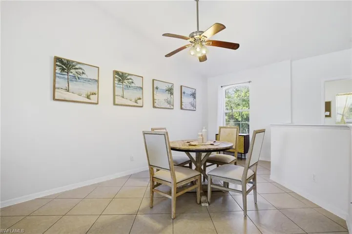 Dining/flex room vaulted ceiling, and lighted ceiling fan
