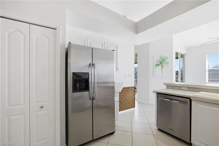 Kitchen featuring appliances with stainless steel finishes