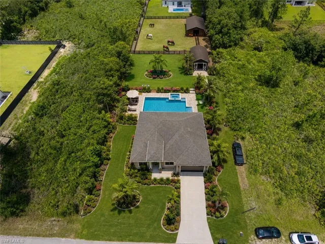 Photos have been virtually enhanced to illustrate the property’s potential. Features shown, including landscaping, pool, and equestrian amenities, are for visualization purposes only and may not exist on the property.