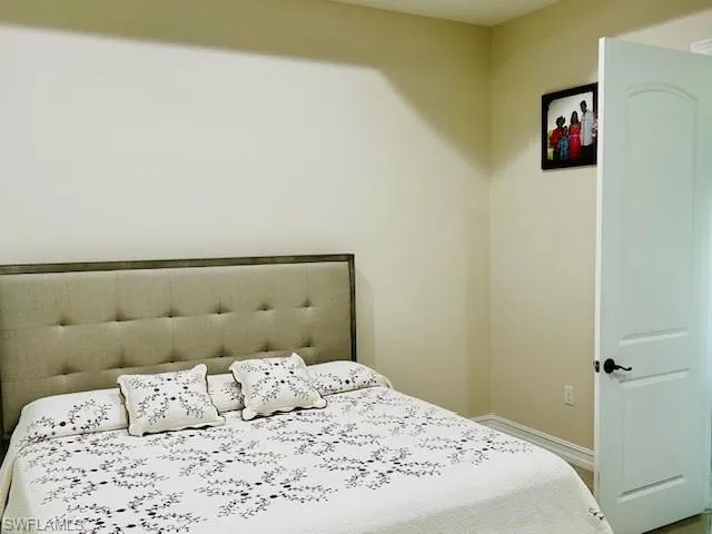 Bedroom with baseboards