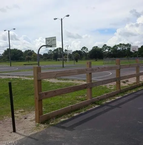 View of gate featuring a yard