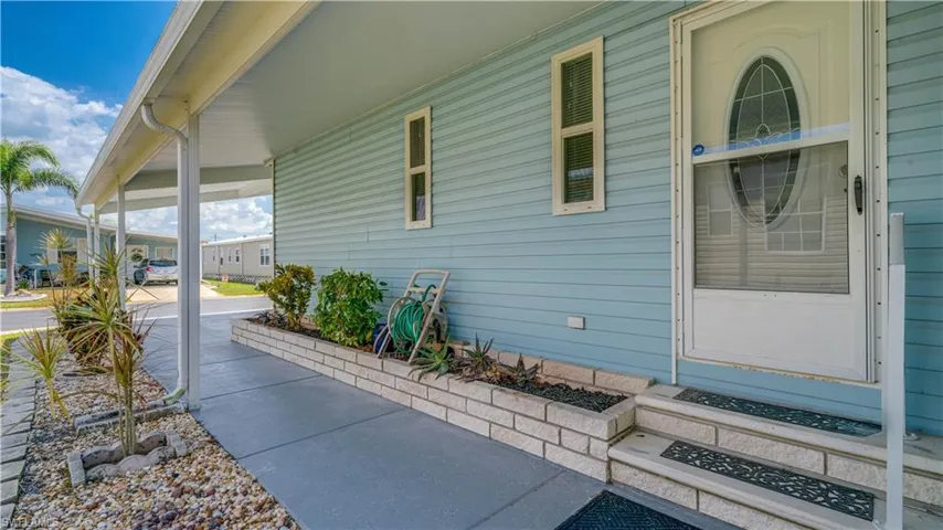 The newer side entrance door is inviting.