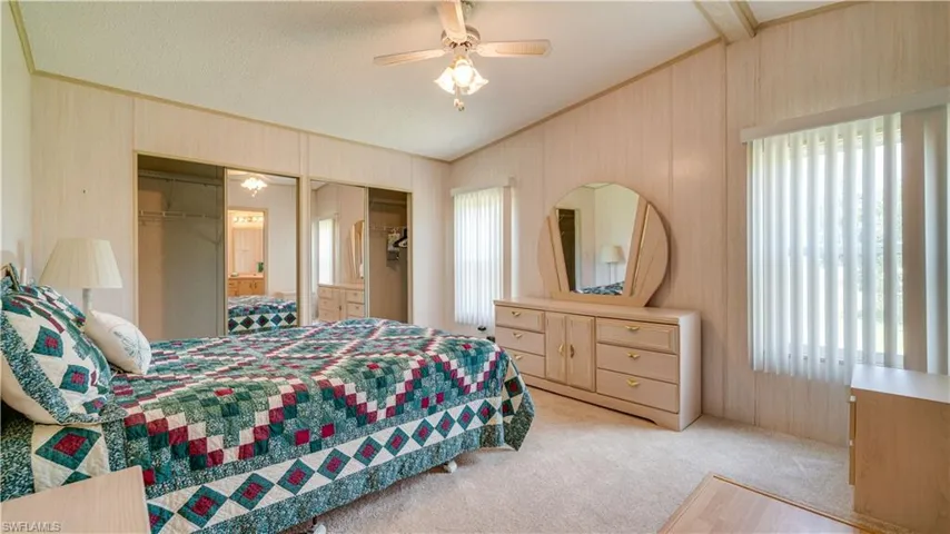 The lighter walls provide warmth to this generously sized master.