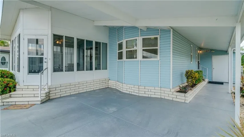 Picture your patio furniture tucked on the carport area.