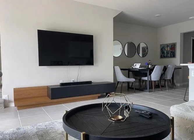 Living room with tile patterned floors