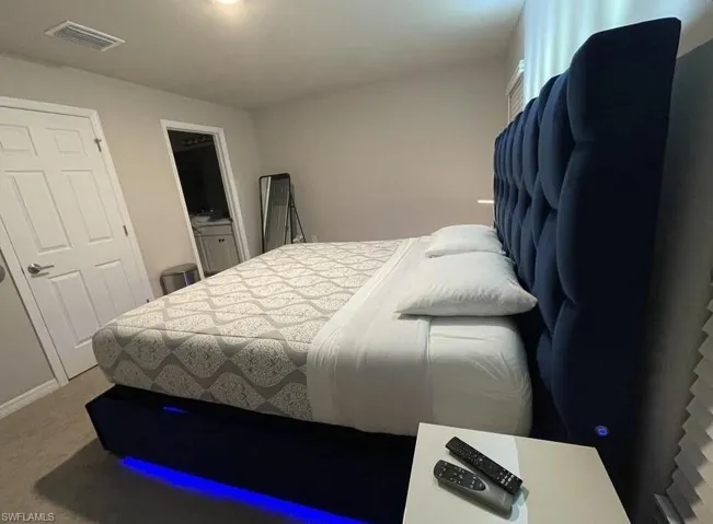 View of carpeted bedroom