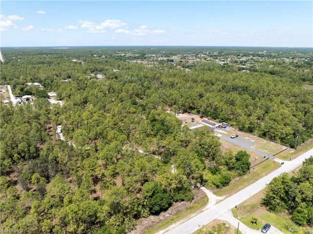 Bird's eye view with a wooded view