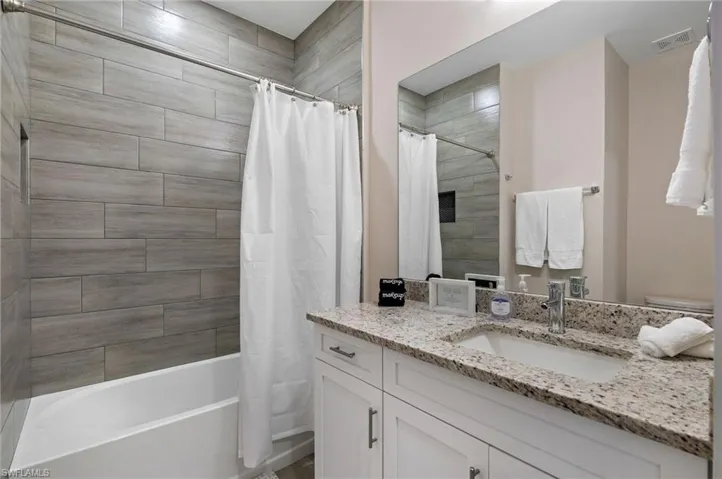 Main Bath with Tub/ Shower combo.