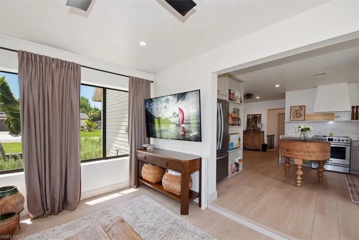 Stairway featuring wood finished floors and baseboards