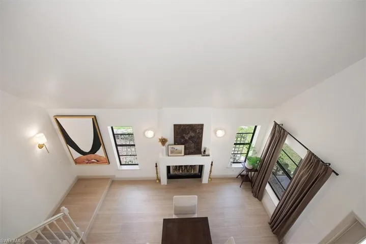 Bedroom with access to exterior, recessed lighting, a ceiling fan, and light wood-style floors