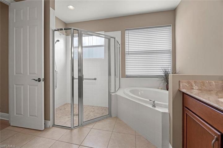Master bath has large soaking tub, large shower