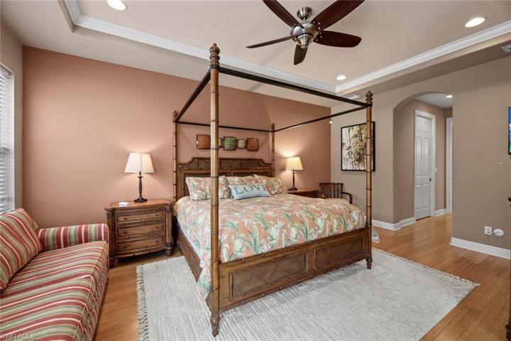 Master bedroom, arched doorway leads to walk-in closets, En-suite bath