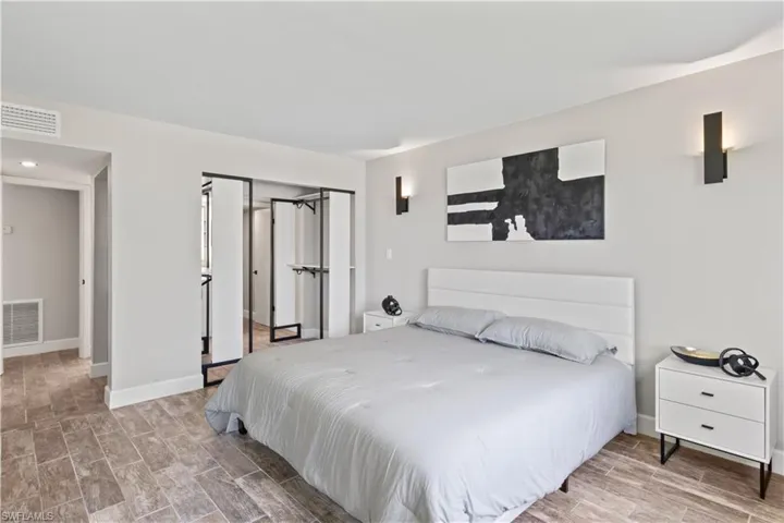 Where functionality meets style—the primary bedroom offers a perfect blend of comfort, elegance, and practical design.