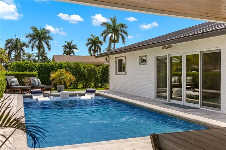 View of pool featuring a fenced in pool