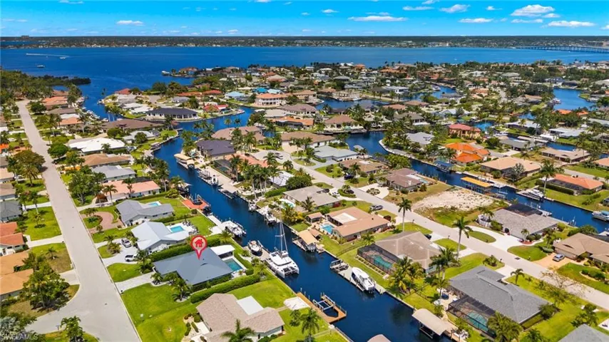 Bird's eye view with a water view and a residential view