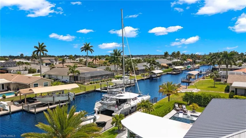Aerial view with a residential view and a water view