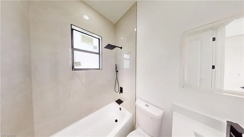 Full bath with tub / shower combination and vanity