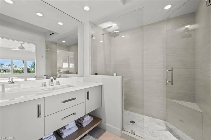Master bath with large walk in shower and double vanity
