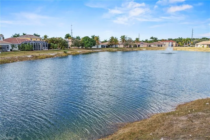 Water view featuring nearby suburban area