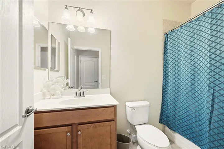 Bathroom with vanity and toilet