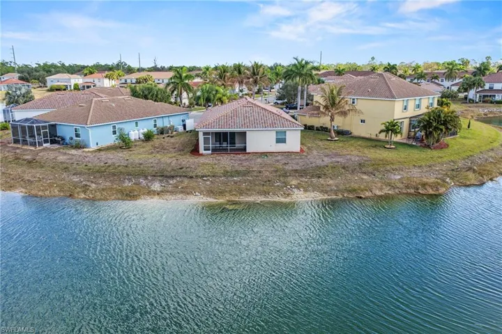 Aerial view of residential area with a nearby body of water