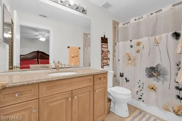 Ensuite bathroom with vanity and shower / bath combo