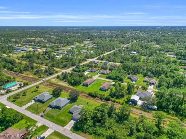 View of property location featuring nearby suburban area