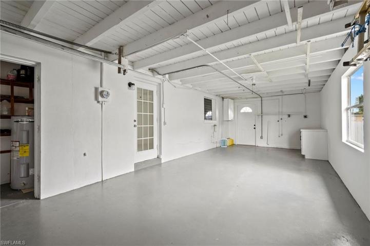 1-car garage is extra deep with storage closet and laundry center