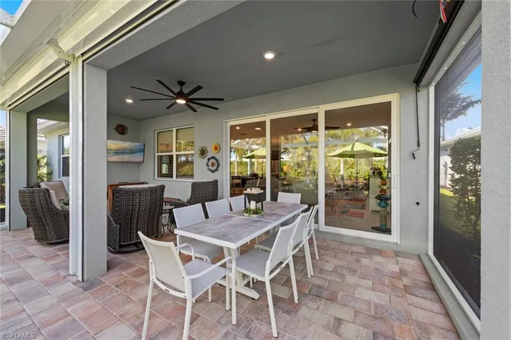 Covered lanai has roll-down storm protection