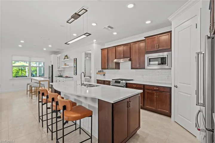 Kitchen w/pantry behind door on right