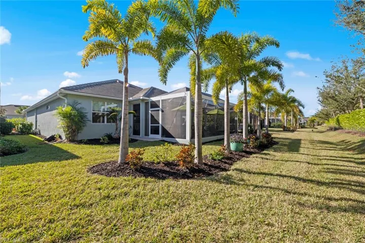 Rear of home w/custom landscaping bed added