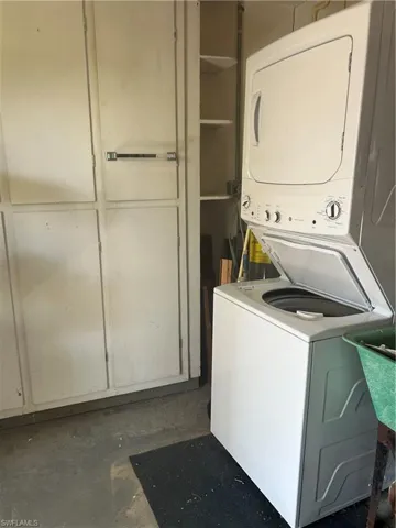 Laundry area with stacked washer / dryer