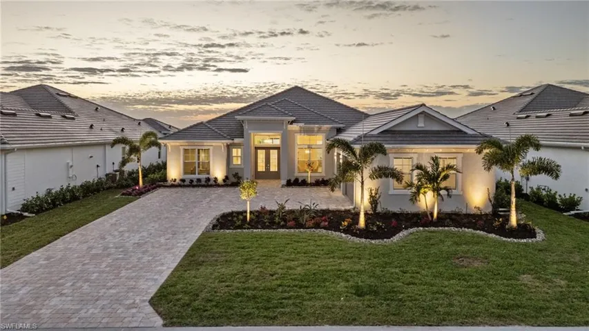 View of front of house featuring a yard