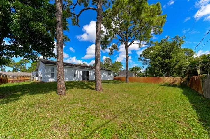 View of fenced backyard