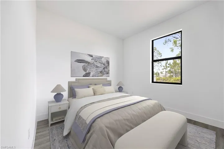 *Virtually Staged*Bedroom with wood finished floors