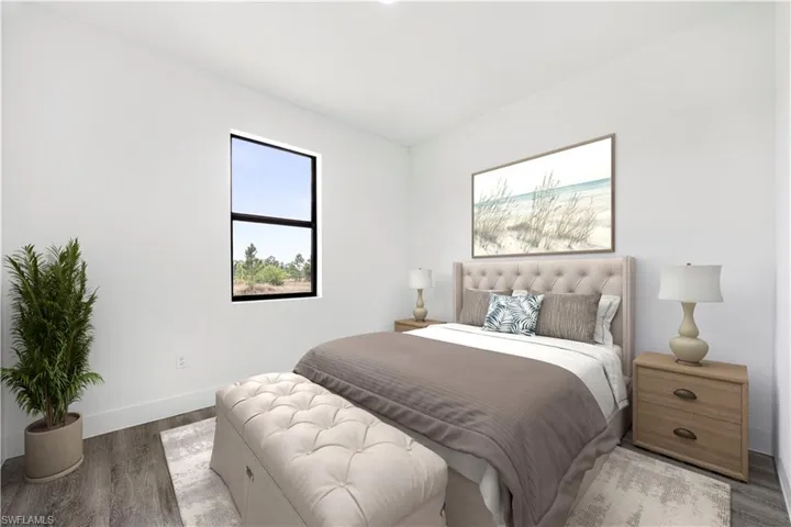 *Virtually Staged*Bedroom with wood finished floors