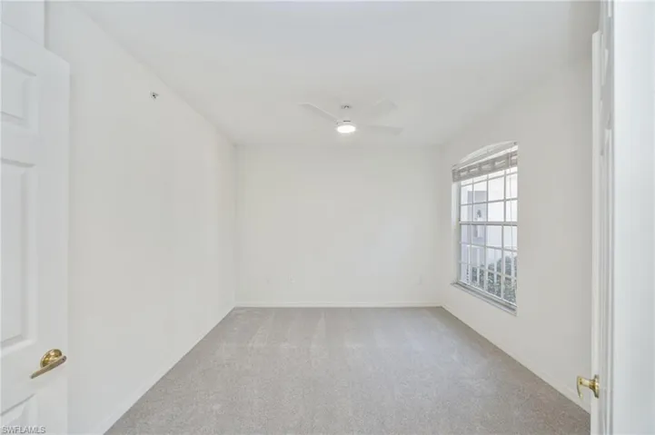 Den/3rd bedroom has double doors, new carpet and a new fan