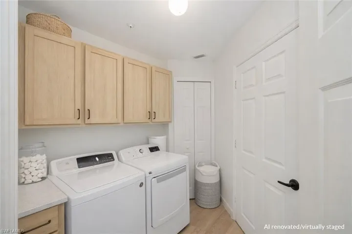 AI Renovated/Virtually Staged. Laundry room.