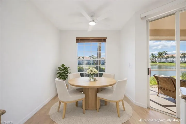 AI Renovated/Virtually Staged.  Eat in kitchen (casual dining area) with lovely lake view