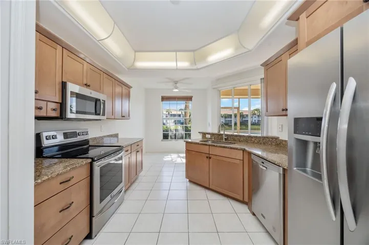 Kitchen with updated cabinetry and stainless steel appliances