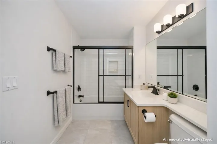 AI Renovated/Virtually Staged. Guest bathroom.