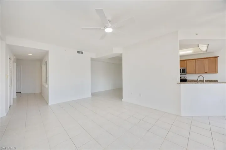 Family room facing kitchen and dining room
