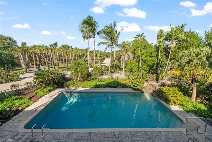 Private pool with a patio area